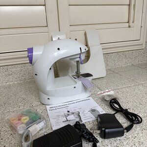 Portable Mini Electric Sewing Machine - Works Excellent